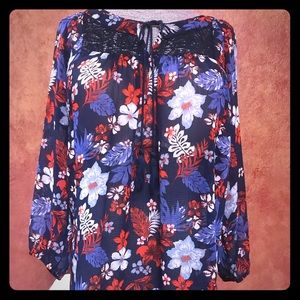 🍀.  Sheer blue, red, and white blouse.